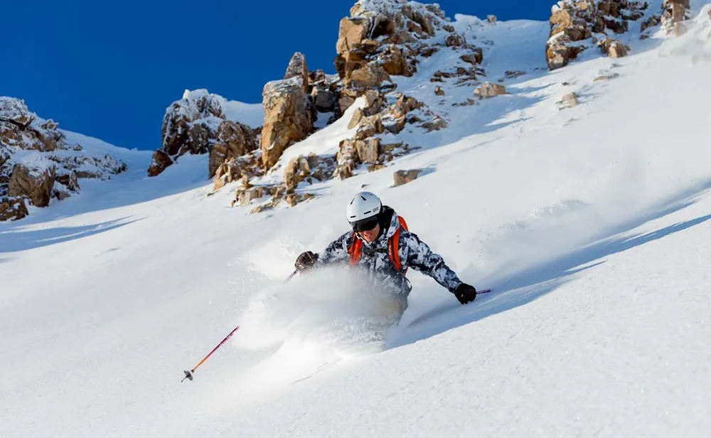 True backcountry riding normally begins somewhere other than a ski area and involves only human-powered ascent.