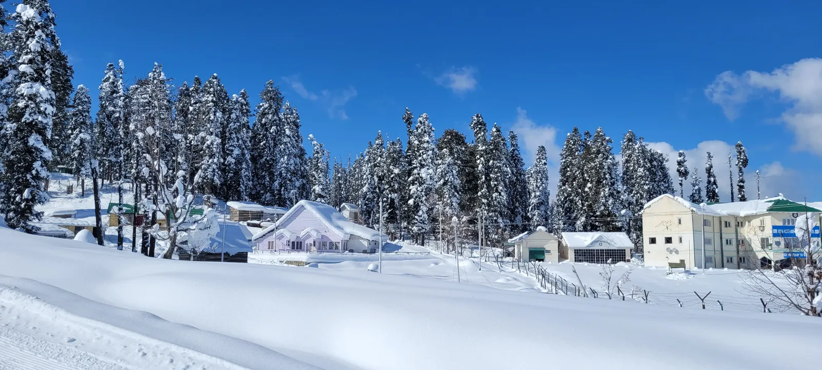 Golden light over Gulmarg ski slopes at the end of a training day